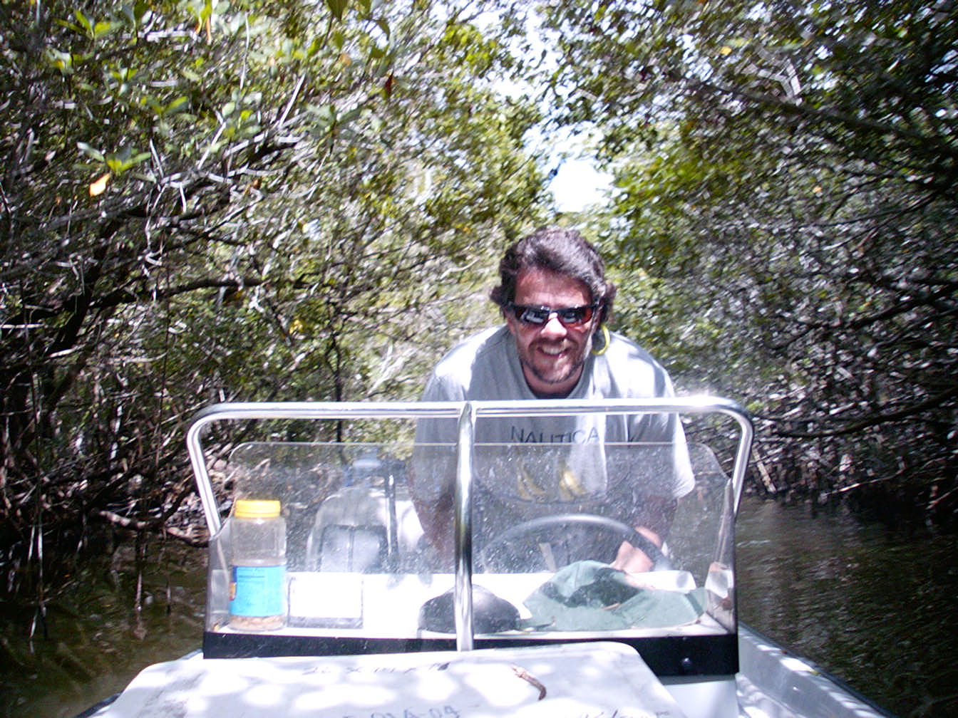 Darren Rumbold driving a speedboat
