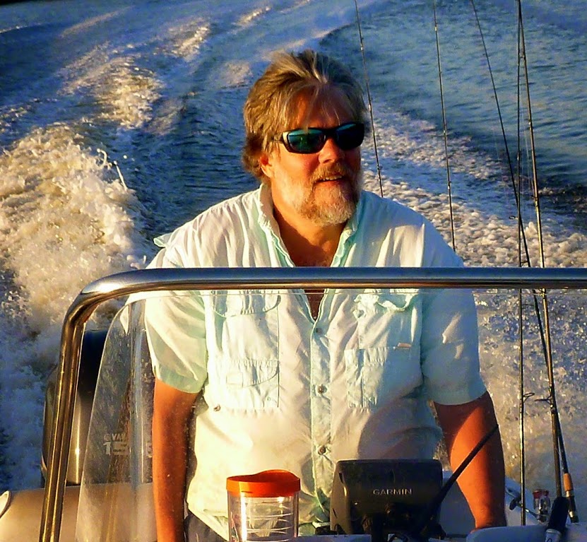 Darren Rumbold on a speed boat