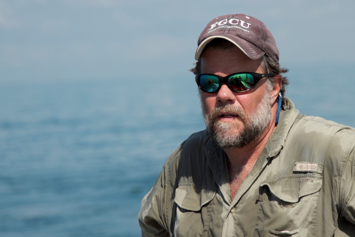 Darren Rumbold with the sea in the background